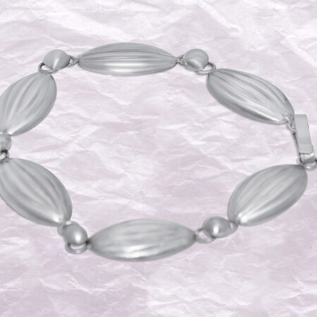 Silver bracelet with oval hallow silver beads