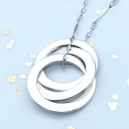 Three ring silver necklace